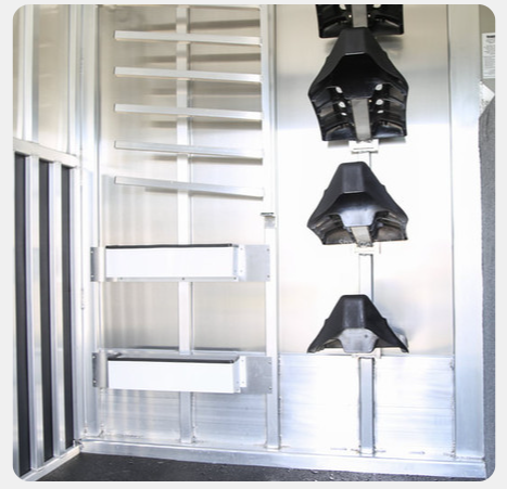 A metal wall with a bunch of boxes on it