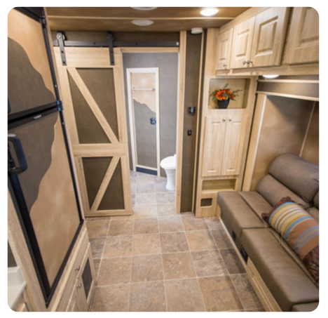 A living room with a couch and a toilet