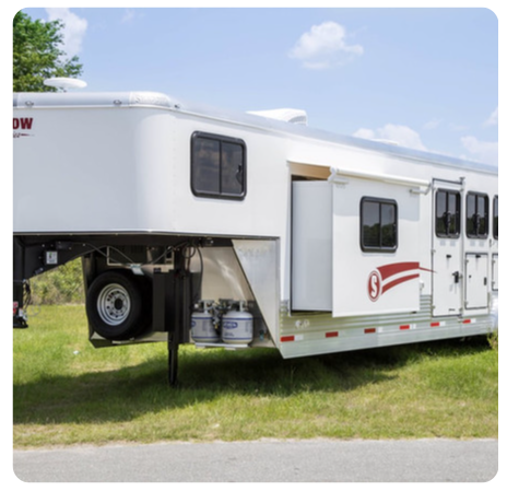 A white trailer with the number 6 on it