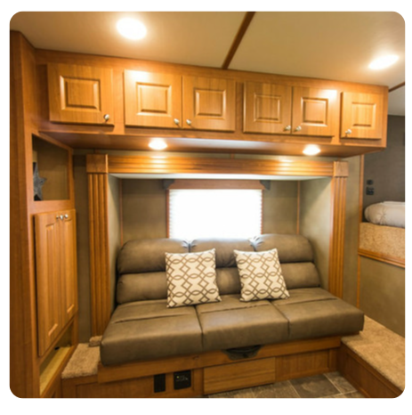 A living room with a couch and a window