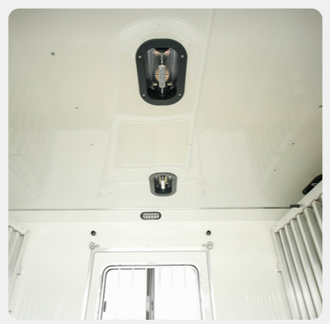 A white ceiling with a light on top of it