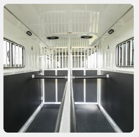 A picture of the inside of a horse trailer