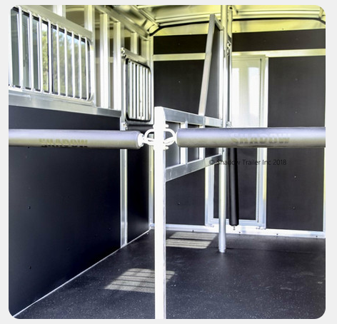 A picture of the inside of a horse trailer taken in 2013