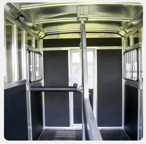 A picture of the inside of a horse trailer