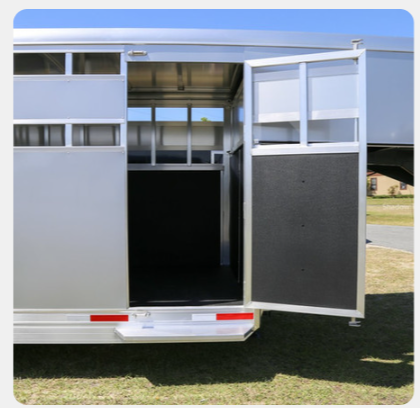 The back of a trailer with the doors open