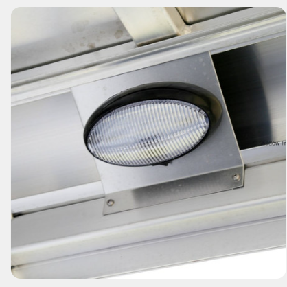 A close up of a light on a ceiling