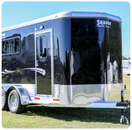 A black trailer with the word shadow on the side