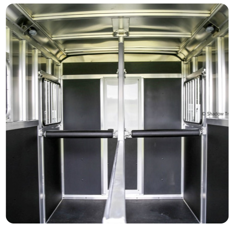 A picture of the inside of a horse trailer