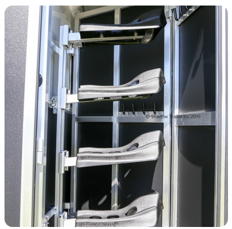 A close up of a horse saddle rack with the year 2011 on it