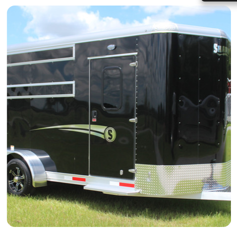 A black trailer with the letter s on it