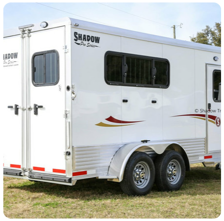 A white trailer with the word shadow on the side