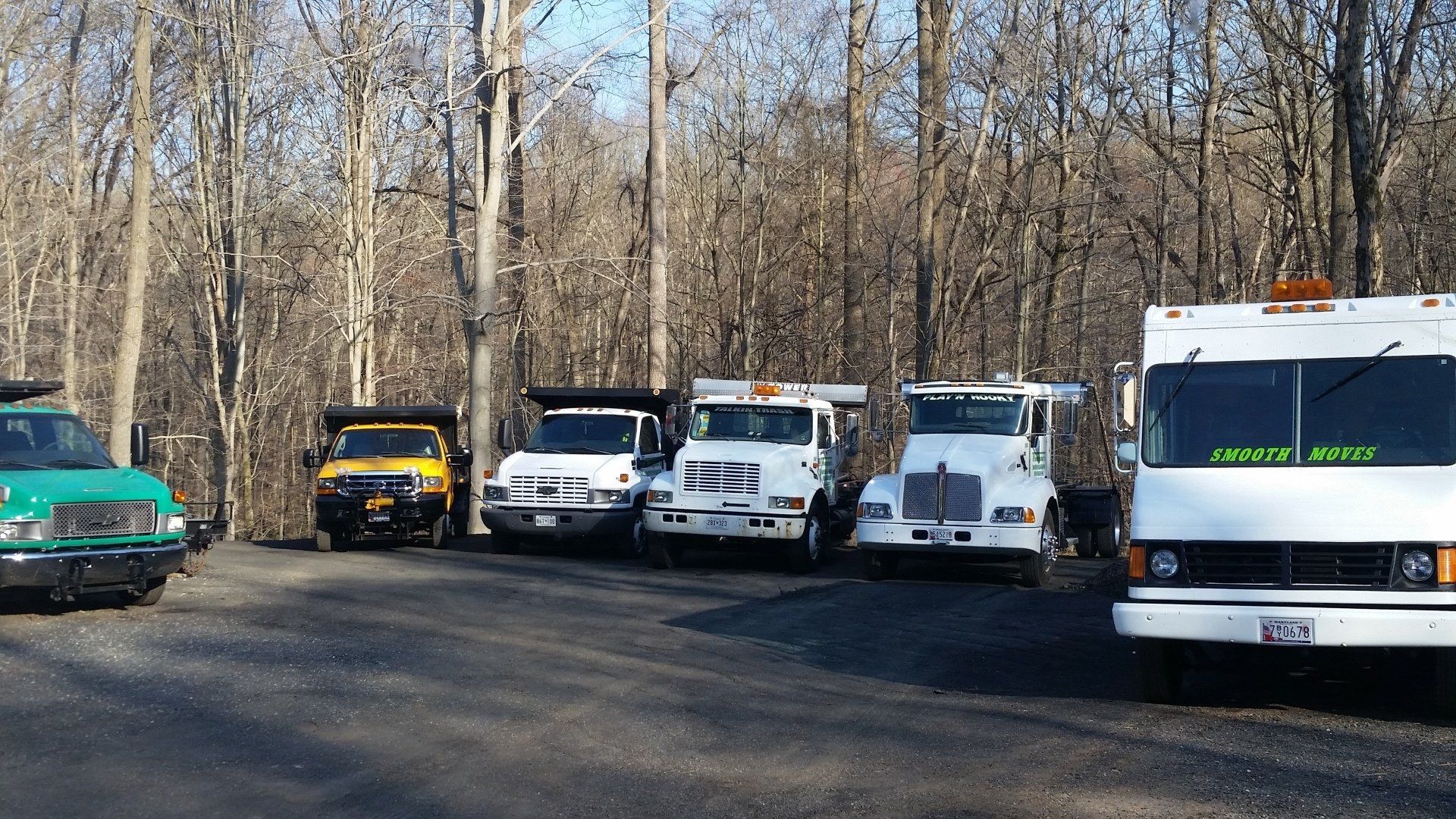 Thompson's Moving Inc. trucks & dumpsters