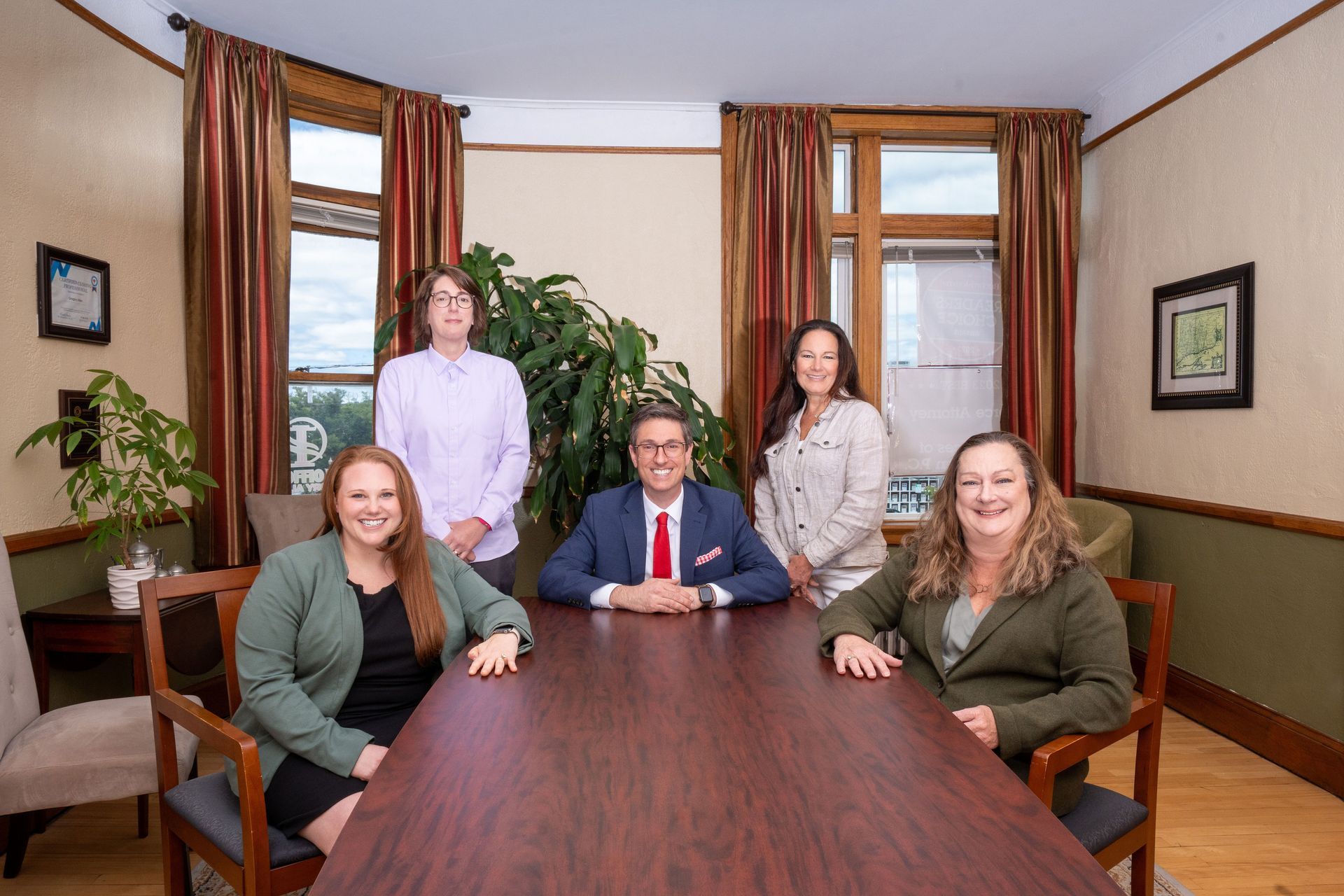 A family law professional at a desk reviewing the 2026 Connecticut Child Support Guidelines document