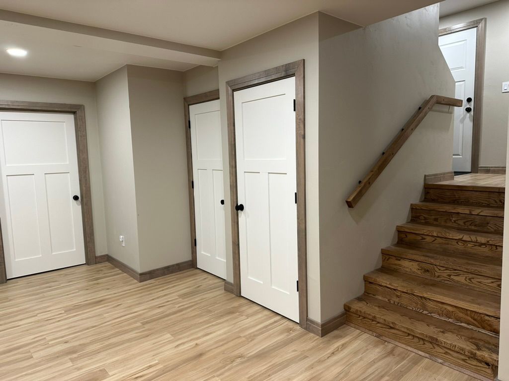 There are stairs leading up to the second floor of a house.