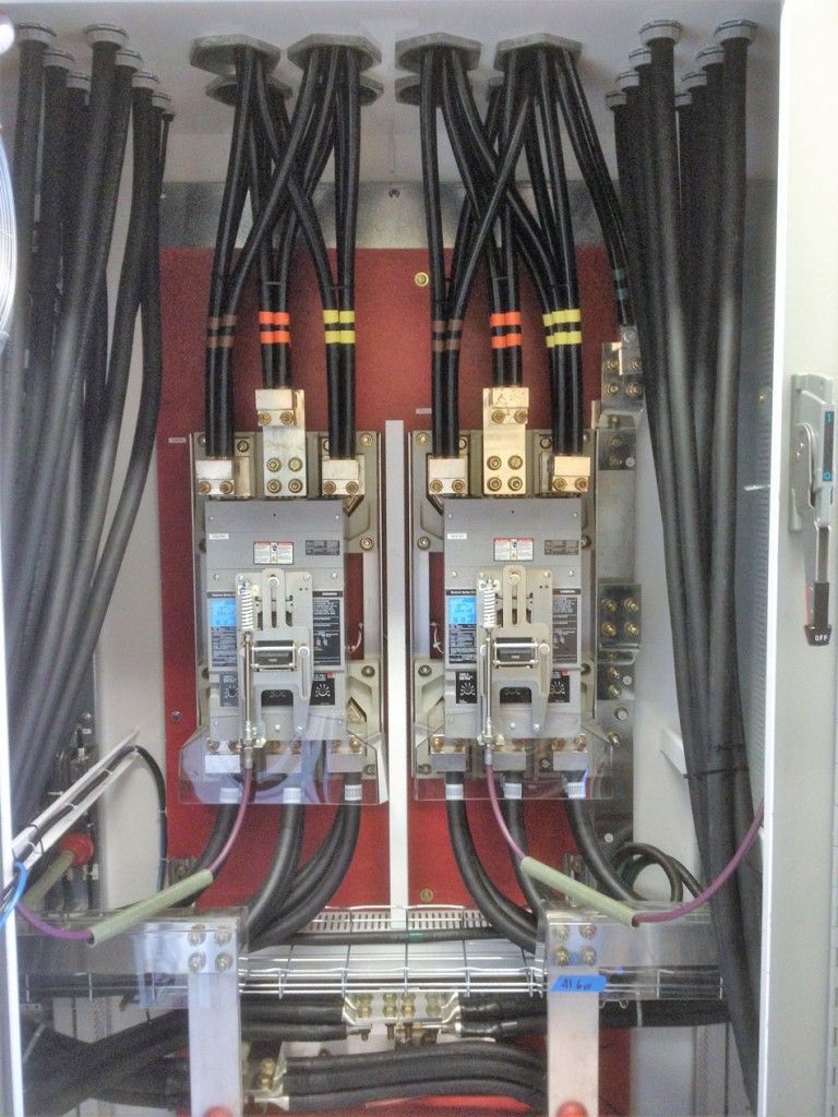 A electrical box with a lot of wires coming out of it