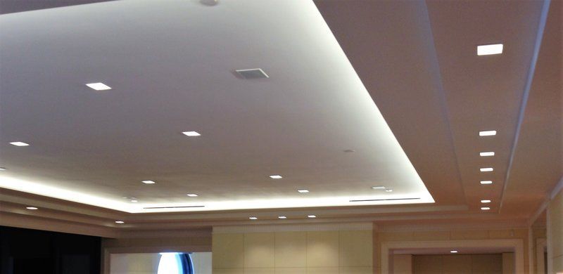 A ceiling with a lot of lights on it