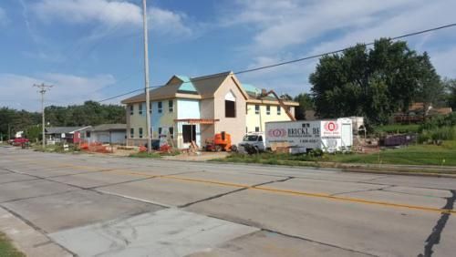 A house is being built on the side of the road.