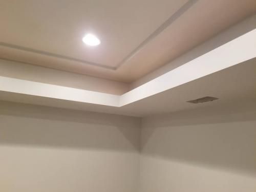 There is a light on the ceiling of the room.