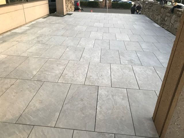 A patio with a lot of tiles on it