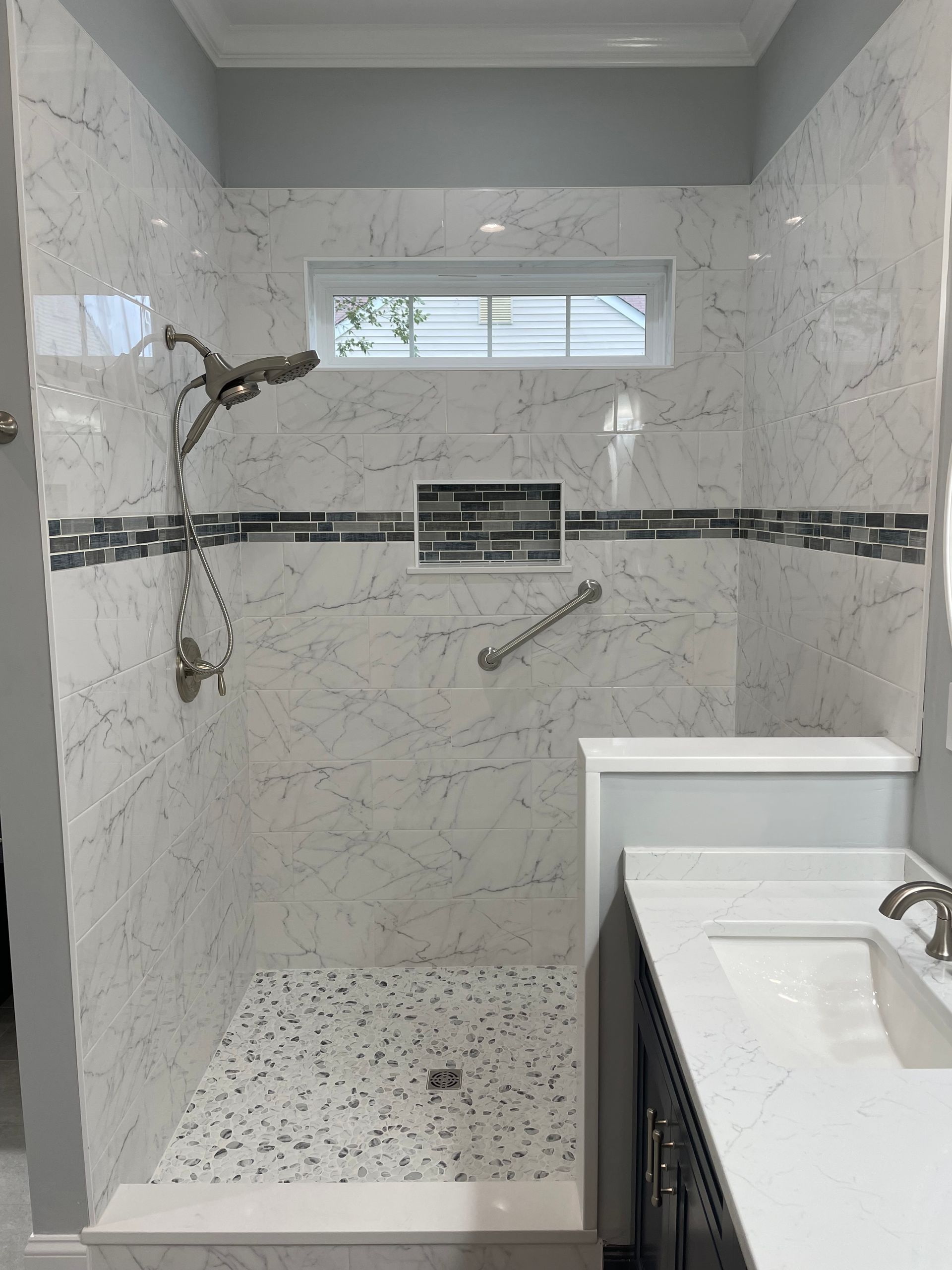 Walk-in shower with small window