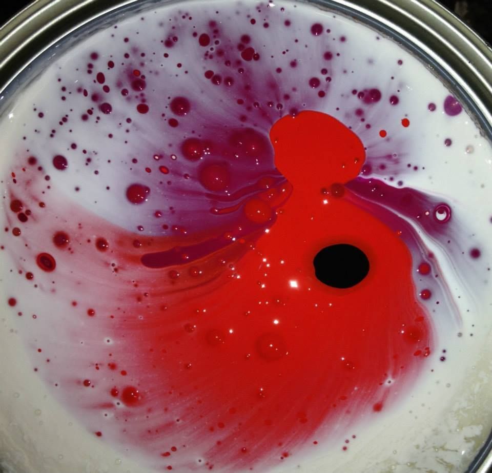 A close up of a red and purple liquid in a bowl