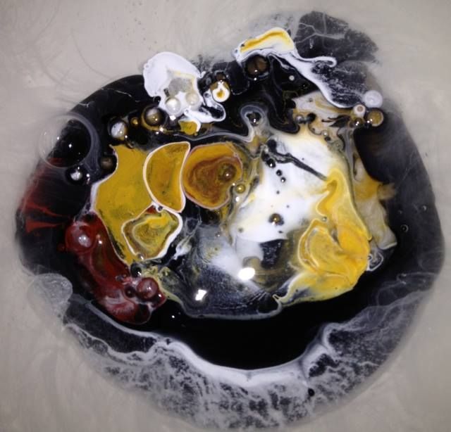 A close up of a painting that looks like a heart