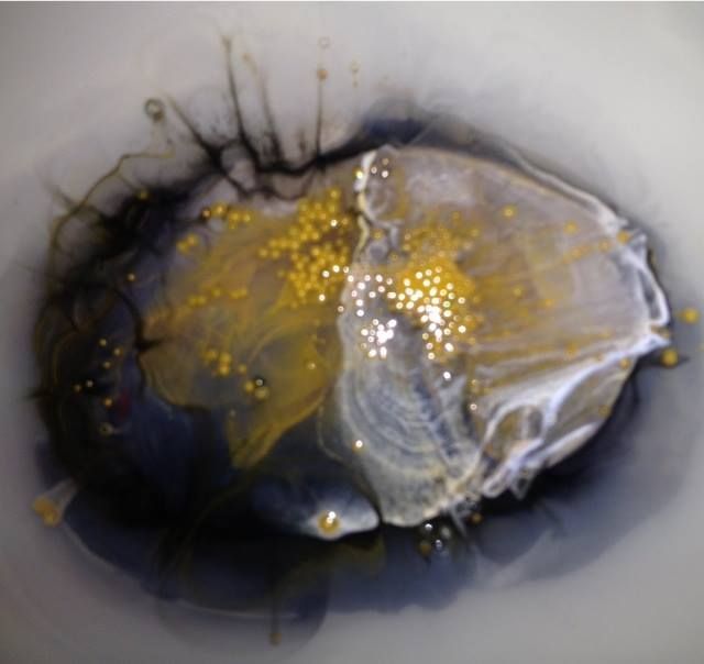 A close up of a painting that looks like an eye