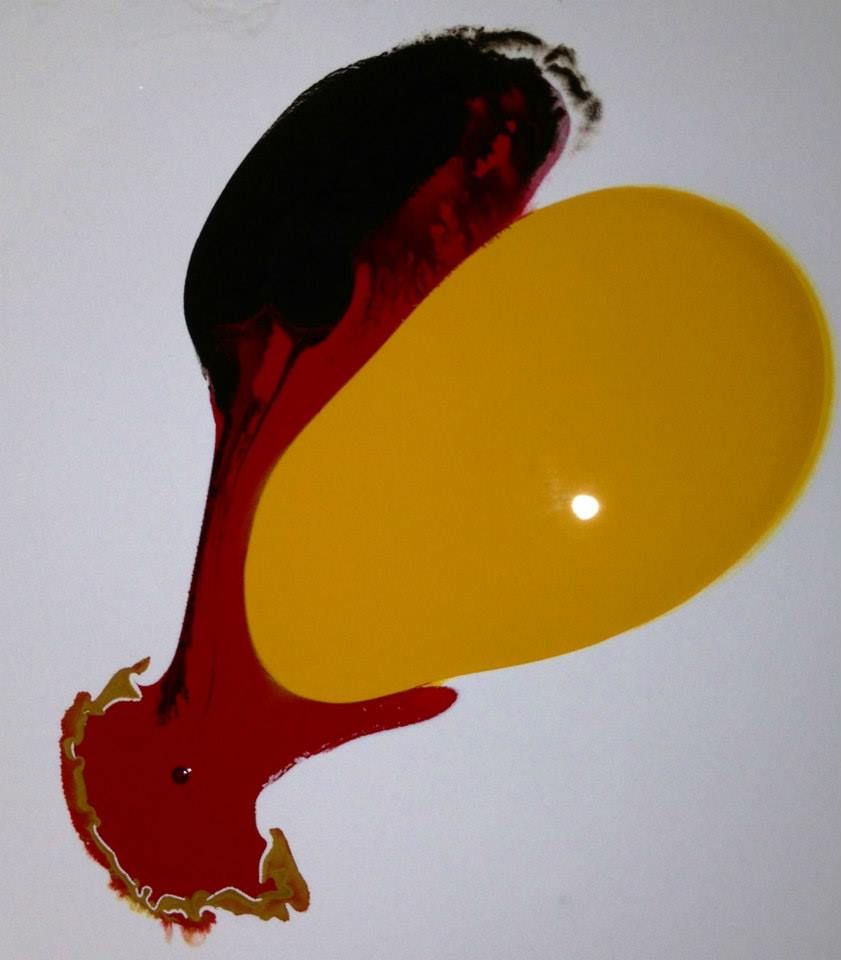 A red and yellow swirl on a white background