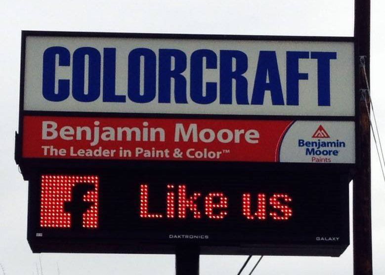 A sign that says colorcraft benjamin moore the leader in paint and color