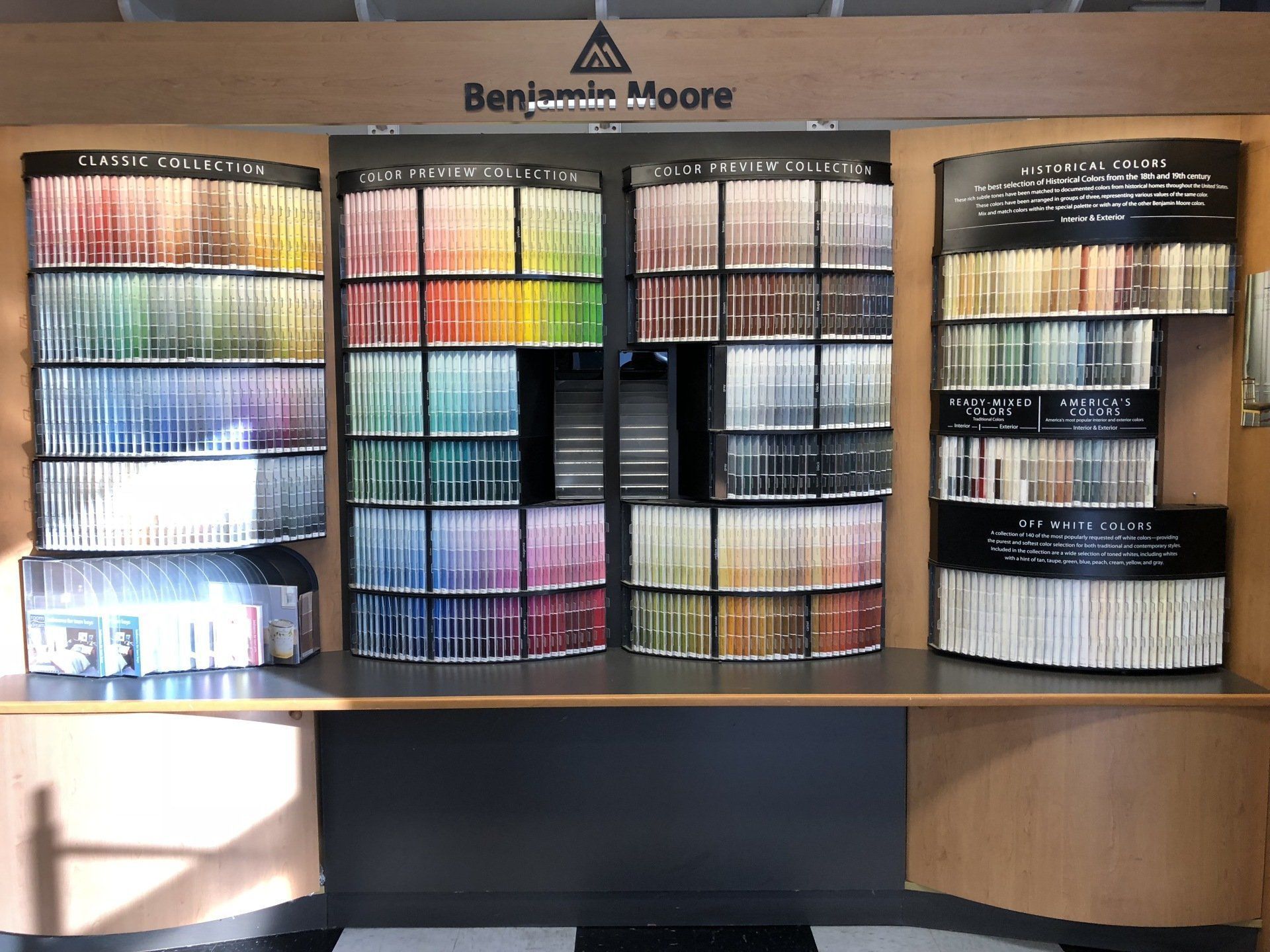 A benjamin moore paint display with many different colors