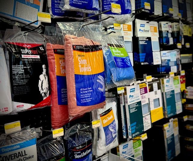 A store shelf filled with a variety of cleaning products