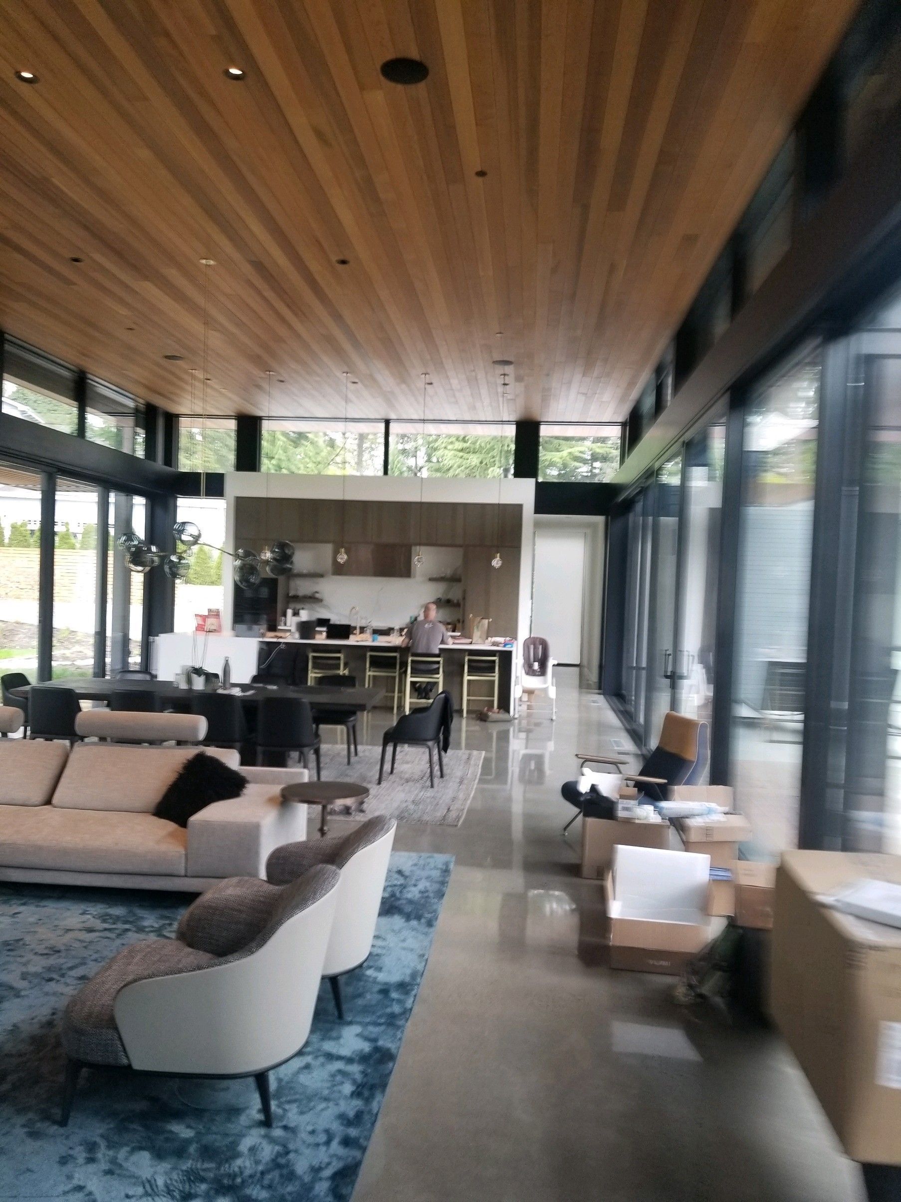 A living room with a couch and chairs in it