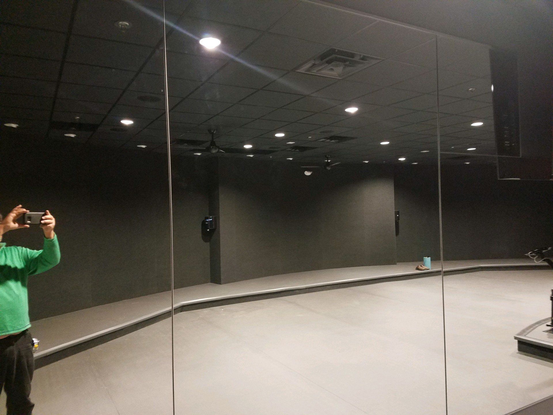 A man taking a picture of himself in a mirror