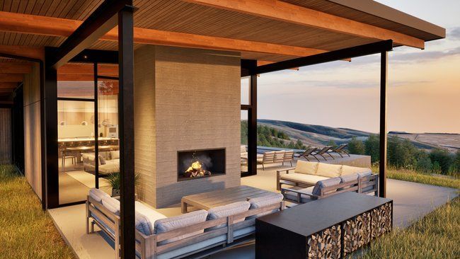 impression of a house with a fireplace and a patio.