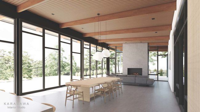 A large room with a table and chairs and a fireplace.