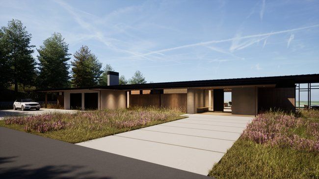 modern house with a car parked in front of it.