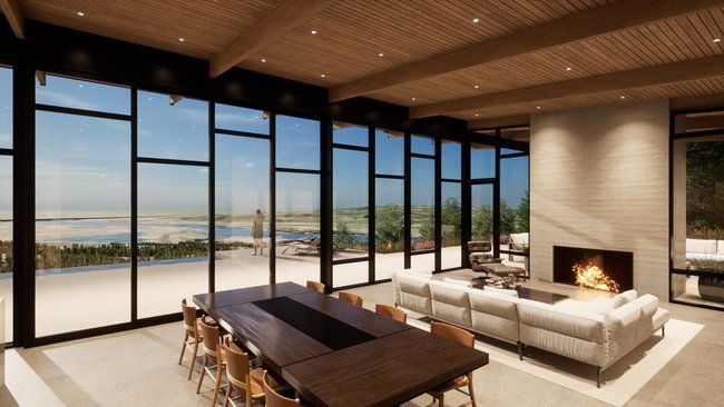 A living room with a fireplace, couch, table, and chairs.