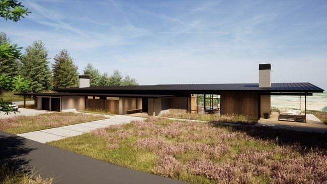 house in the middle of a field.