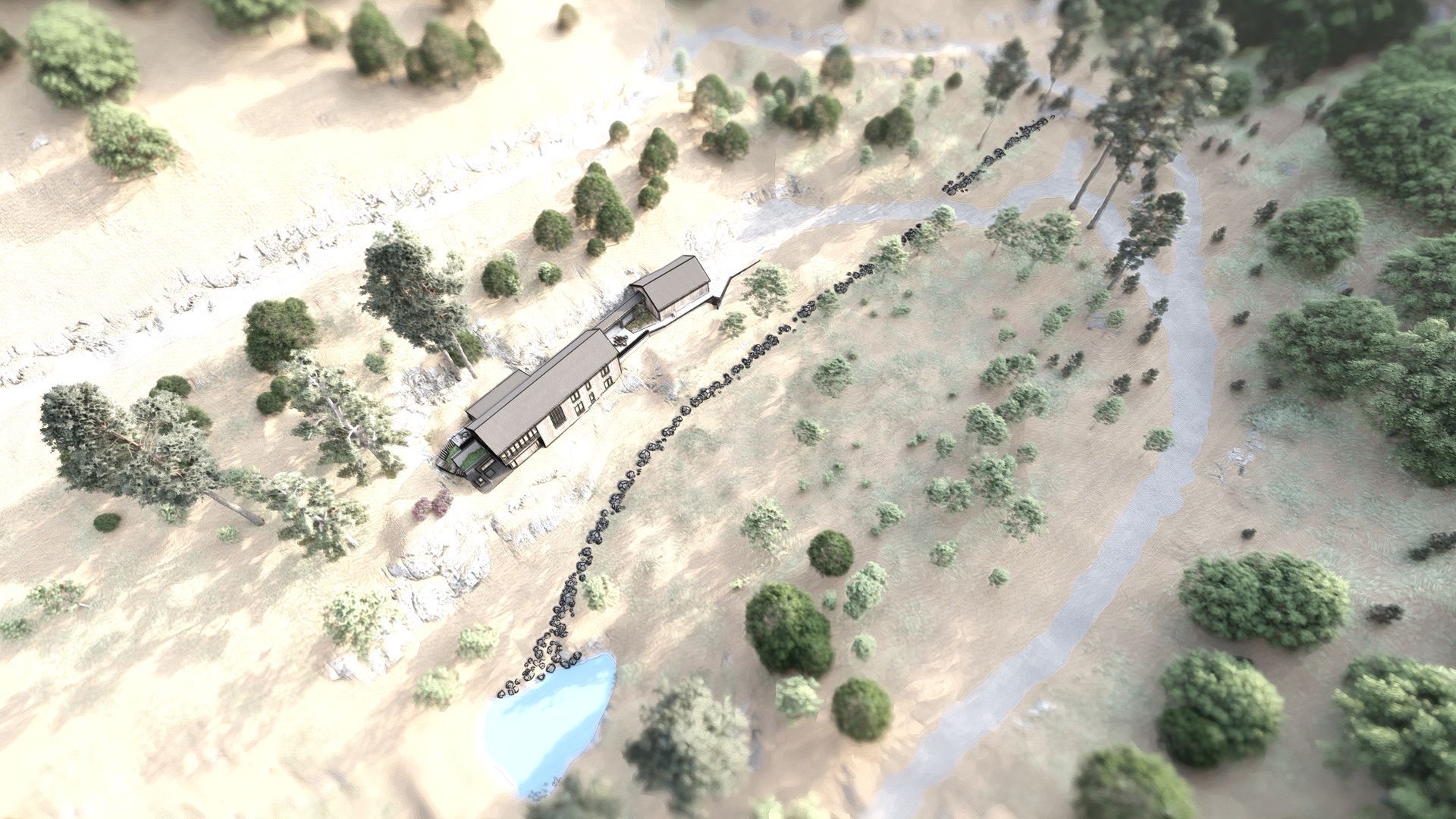 An aerial view of a house in the middle of a field surrounded by trees.