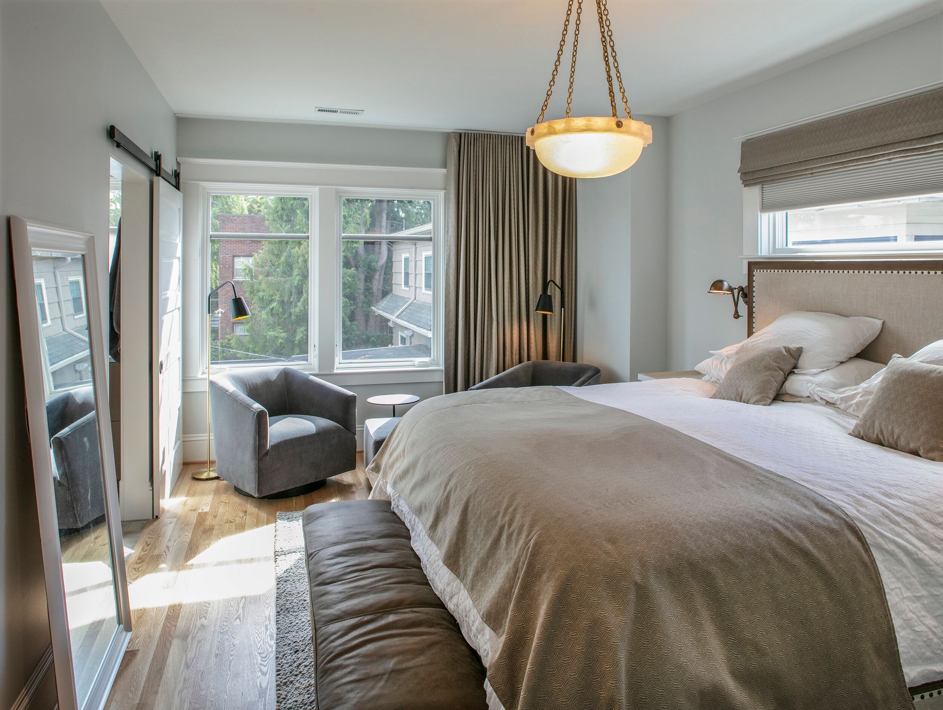 There is a large bed in the middle of the room.