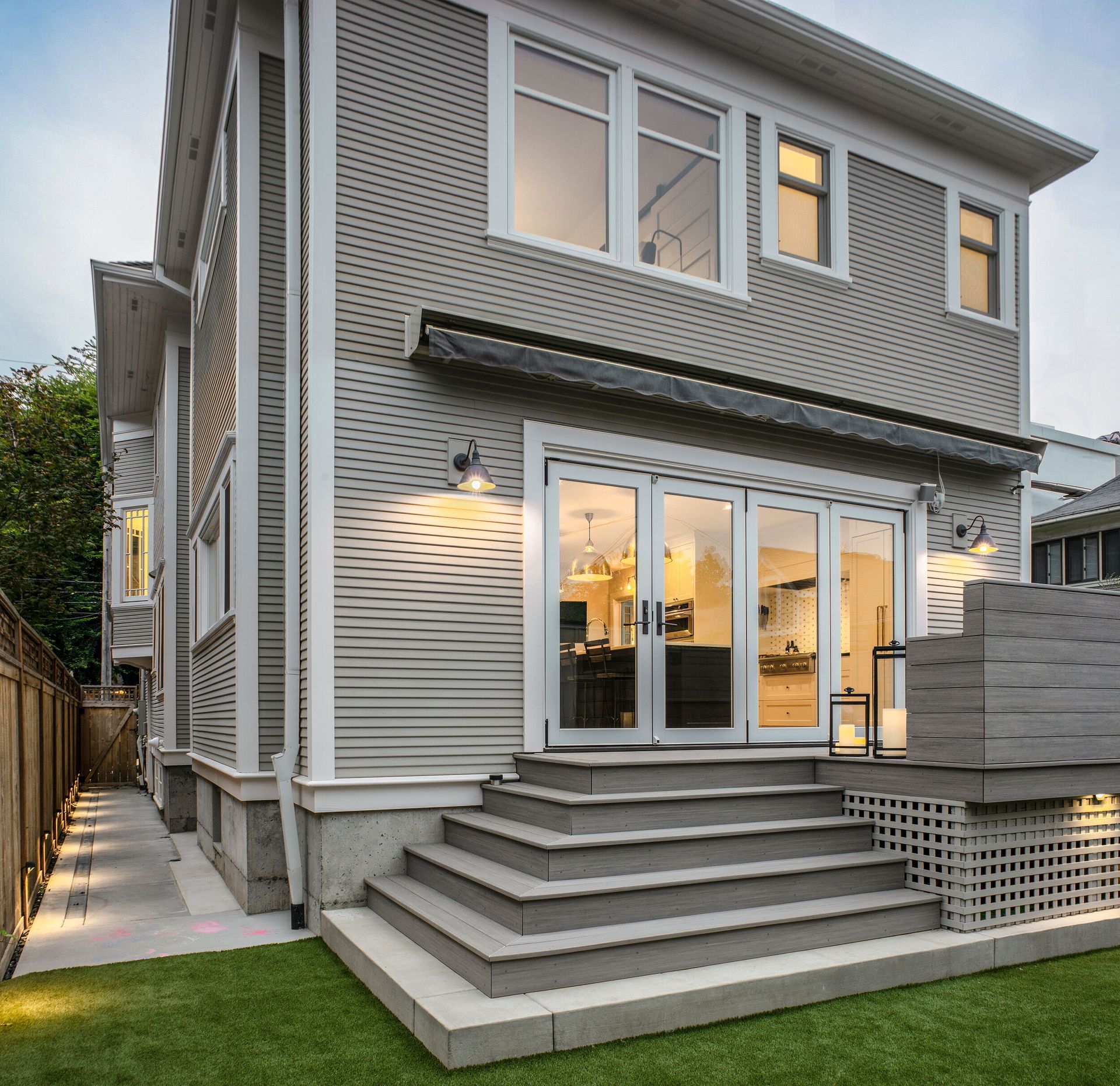 A house with a lot of windows and stairs