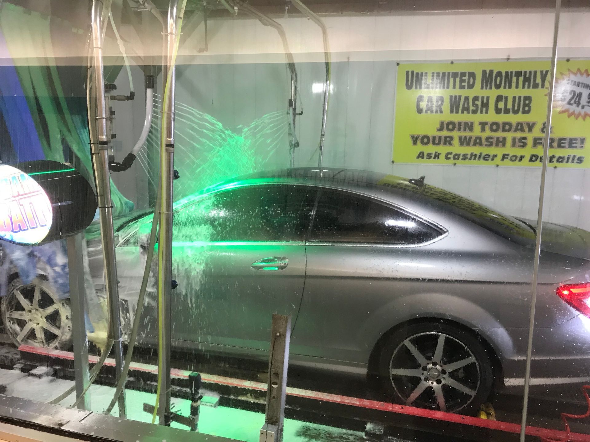 car wash green soap drivers side silver car