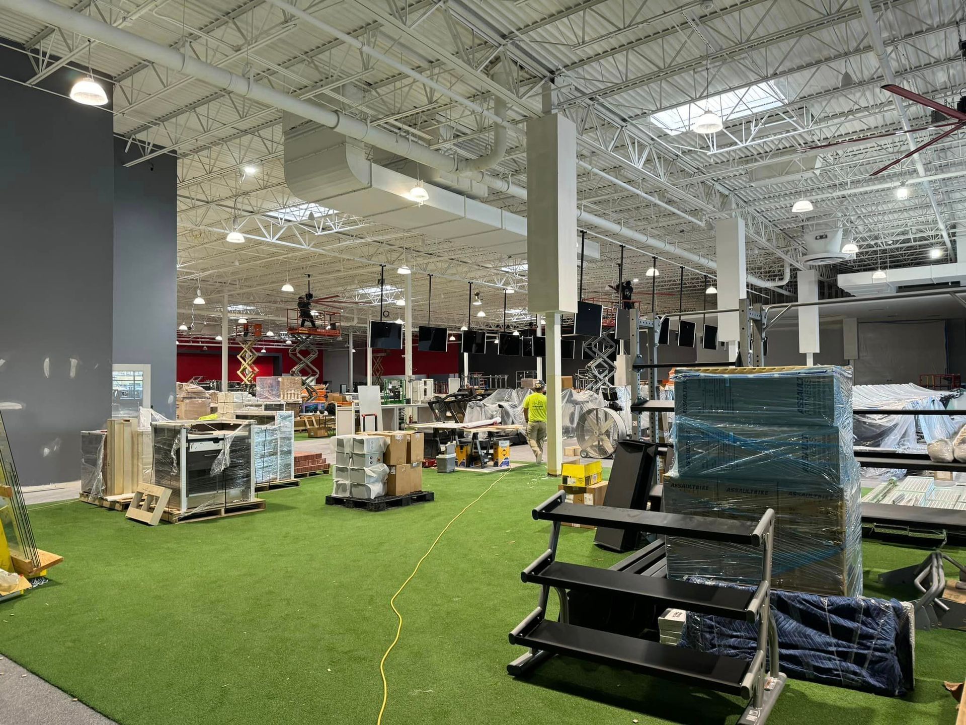 A large industrial facility filled with lots of equipment and boxes