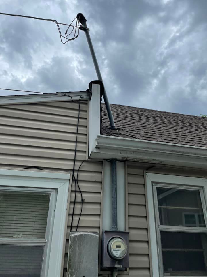 A house with a power meter on the side of it