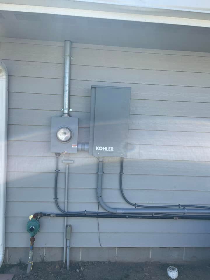 There is a meter on the side of a house