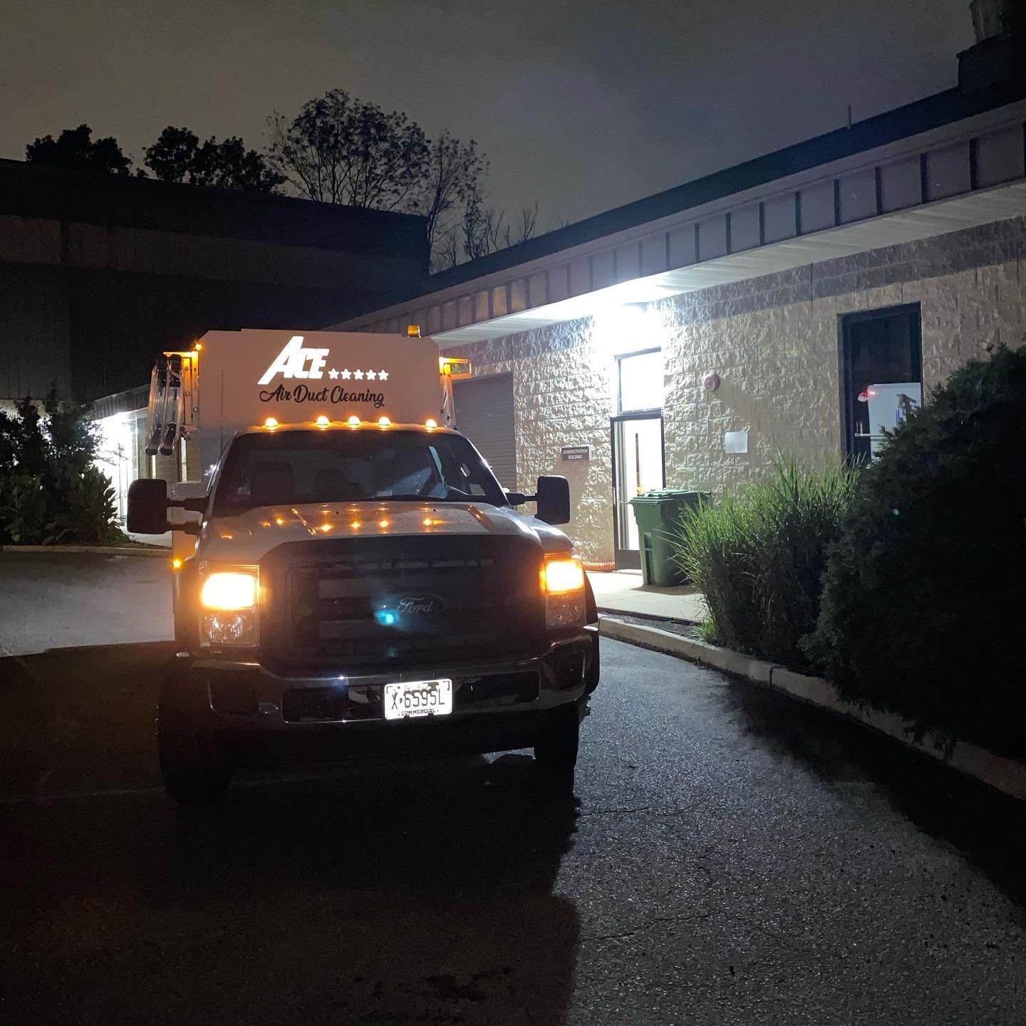 A truck that says at on the side of it