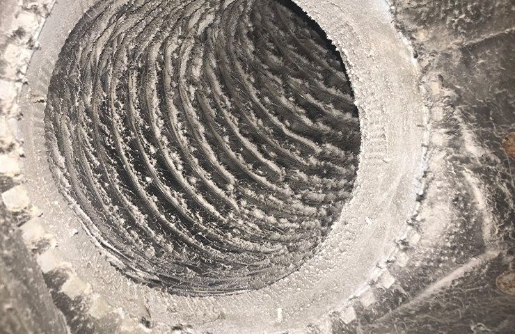 A close up of a metal object with a hole in it.