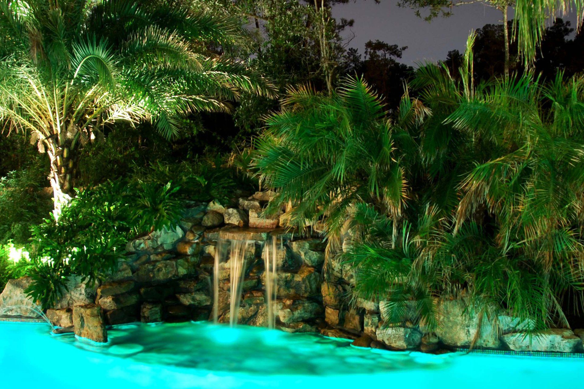 Swimming pool with falls