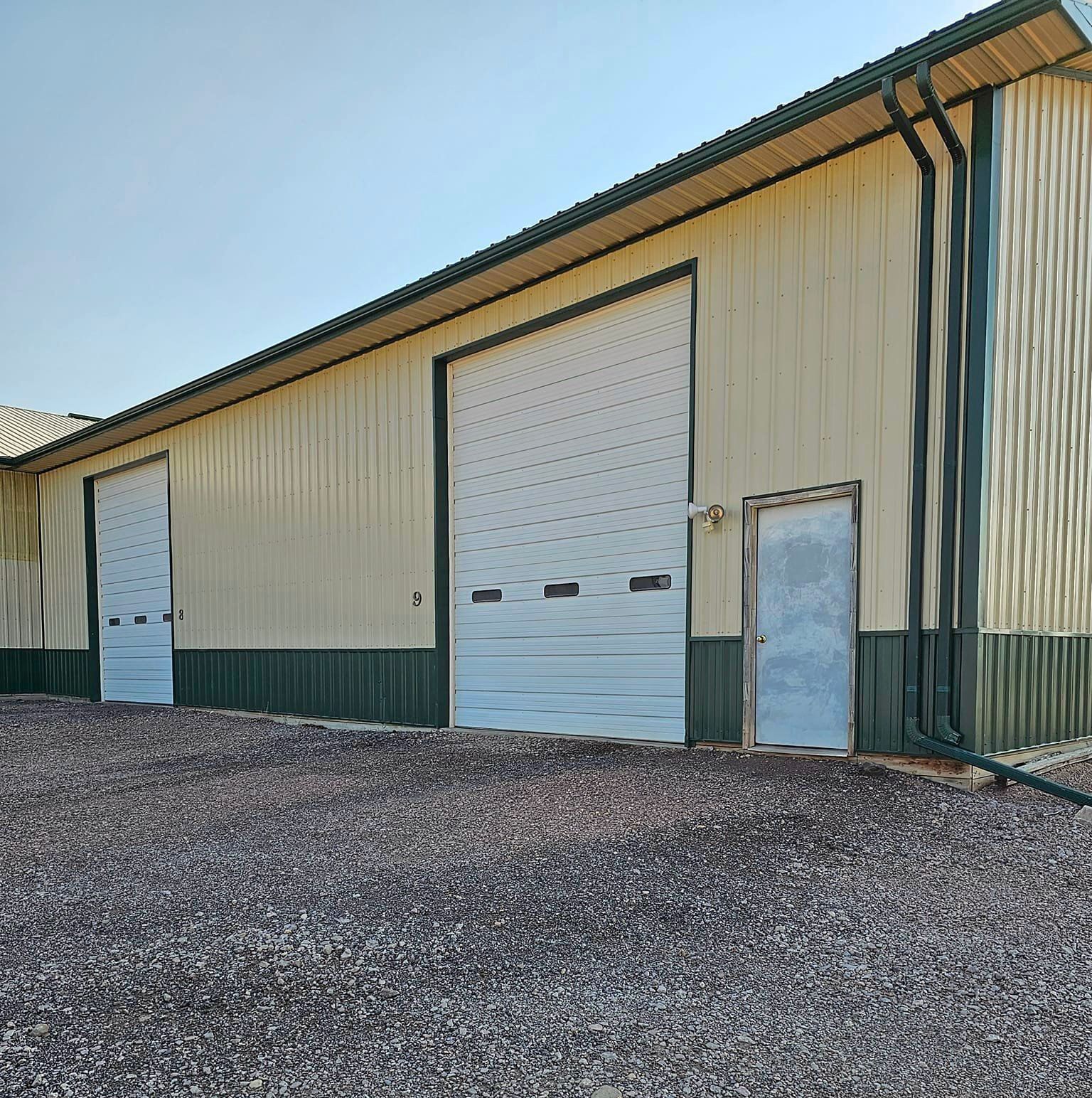 A large building with a lot of garage doors