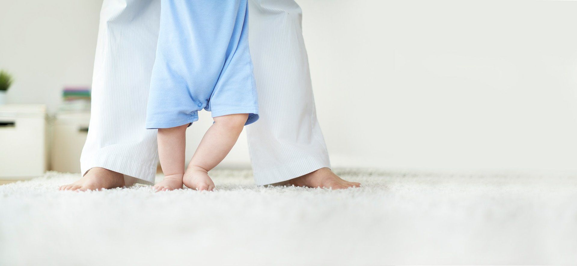 Baby walking on carpet